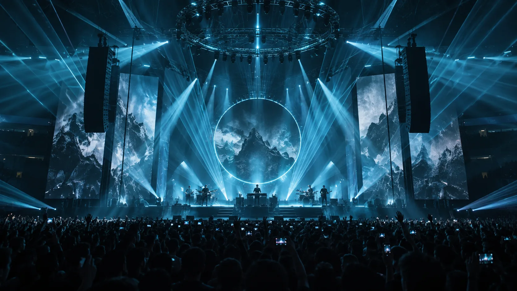 Professional concert stage lit by teal and blue laser beams